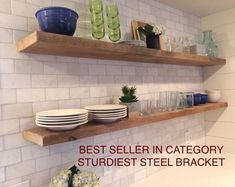 two wooden shelves filled with dishes on top of a white tiled kitchen counter next to a sink