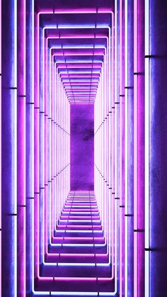 an image of a tunnel with neon lights going through it and the light at the end is pink