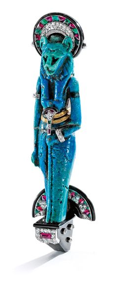 a blue figurine is standing on top of a skateboard with jewels in its hands