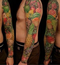 the man has many tattoos on his arms and legs, including pineapples, bananas, apples, watermelon