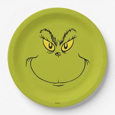 a paper plate with the grin face drawn on it