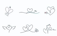 some hearts and flowers are drawn on paper