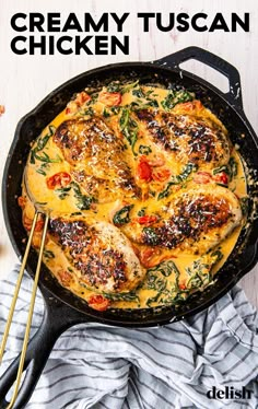 a skillet filled with creamy tuscan chicken