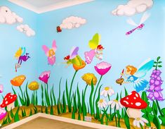 a child's room decorated with flowers, butterflies and fairy pictures on the wall