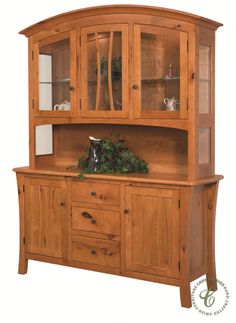 a wooden china cabinet with glass doors and drawers