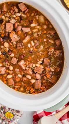 Cajun 15 Bean Soup with smoked turkey cooked low and slow in the crockpot. This hearty, flavor-packed soup is perfect for using leftover turkey. An easy and comforting meal for chilly days! #CrockpotSoup #CajunBeanSoup #LeftoverTurkey Turkey Recipes Soup, Leftover Smoked Turkey Recipes, Soup With Smoked Turkey, Cajun 15 Bean Soup, Leftover Smoked Turkey, Using Leftover Turkey, Homemade Turkey Soup, Slow Cooker Lentil Soup, Pinto Bean Soup