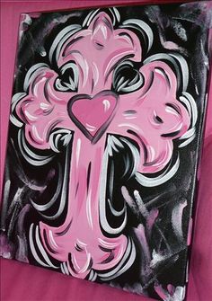 a painting of a pink cross with a heart on it