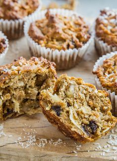 muffins cut in half sitting on top of a wooden cutting board