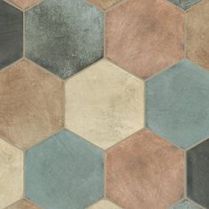 an image of a tile floor that looks like hexagonals with different colors