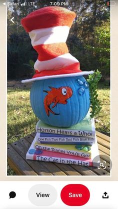 the cat in the hat pumpkin is stacked on top of each other and has books