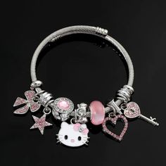 Adorable Hello Kitty Charm Bracelet! Comes Complete With 7 Charms Plus Spacers. Hypoallergenic. Great Gift For Hello Kitty Fans Young Or Not So Young. Comes In A Gift Box With A Pretty Organza Ribbon. Bundle & Save. Proceeds Will Help Cats & Kittens In Need. Hello Kitty Charm Bracelet, Trendy Silver Jewelry With Cat Design, Casual Silver Metal Charm Bracelet, Casual Silver Charm Bracelet As Gift, Cute Metal Charm Bracelet, Trendy Pink Hello Kitty Jewelry, Adjustable Pink Stainless Steel Charm Bracelet, Cute Adjustable Metal Charm Bracelet, Adjustable Metal Charm Bracelet, Cute Style