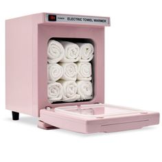 the electric towel warmer is pink and has six rolled up towels in front of it