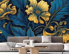 a living room with a couch, coffee table and wall mural in blue and yellow