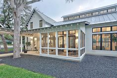 a large white house with lots of windows