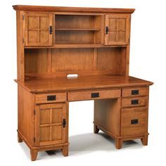 a wooden desk with drawers and cupboards