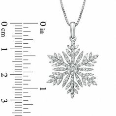 Look cool even on the hottest day. Fashioned in sterling silver, this intricately designed snowflake pendant is completely outlined with a sparkling array of shimmering diamonds and finished with a bright polish. Radiant with 1/2 ct. t.w. of diamonds, this pendant suspends along an 18.0-inch box chain that secures with a spring-ring clasp. White Gold Diamond Snowflake Jewelry, White Snowflake Fine Jewelry, Snowflake Pendant, Book Jewelry, Box Chain, Look Cool, Spring Rings, Diamonds, Sparkle