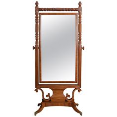 an ornate wooden mirror on stand with white background