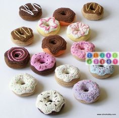 crocheted doughnuts are arranged on a table with the words do good written below them