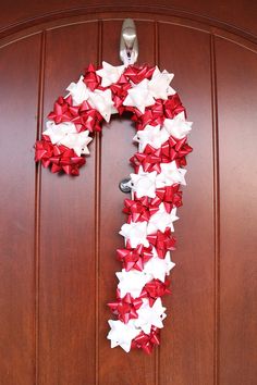 a door decorated with red, white and blue bows