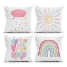 four pillows with hearts and rainbows on them