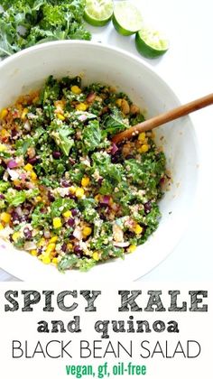 spicy kale and quinoa salad in a white bowl with a wooden spoon