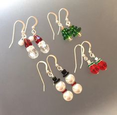 six pairs of earrings with beads and bows