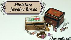 miniature jewelry boxes and necklaces are displayed on a table with the words miniature jewelry boxes