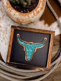 The Turquoise Bull is a great addition to any home with a western aesthetic. The vibrant design adds a burst of color to any space, making it the perfect way to infuse your interior design with a touch of the wild west. All wooden design with faux turquoise Dimensions 8.5”x 7.5” Handmade in the United States Western Grunge Aesthetic, Western Office Decor, Old West Decor, Cowhide Decor, Room Organization Bedroom, Western Rooms, Wood Art Diy, Native American Decor, Salon Suites Decor