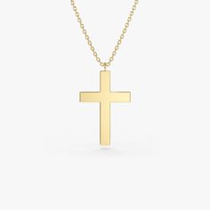 Gold KT: 14K
Recycled Gold
Custom Gold Color: Rose Gold, Yellow Gold, White Gold
Cross: 18 x 11 MM

Give your jewelry collection a personalized touch with our gold necklace. Subtle and sleek, this custom necklace is made from 14k gold. The gold letter necklace is handcrafted with love making it the perfect great gift for someone special. Cross Charm Necklace, Gold Letter Necklace, Christmas Necklace, Gold Letter, Cross Jewelry, Gold Letters, Gold Cross, Cross Charms, Recycled Gold