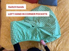 a person laying on top of a bed covered in a green polka dot blanket with the words switch hands left hand in corner pockets