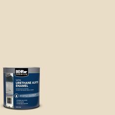 a can of behr paint on a white background