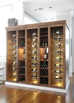 a wine rack in the middle of a room