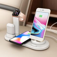 an apple watch and iphone charging station on a table