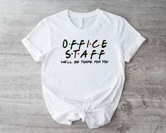 a white shirt with the words office staff written on it