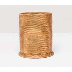 a large woven basket on a white background