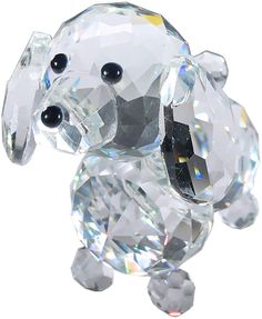 PRICES MAY VARY. This Ornament Dog Statue Collectible with a black nose is perfect for any dog lover. This canine is looking for their forever home. They are very good in practically any living situation, They're ability to stay is unparalleled, won't run away, doesn't require house training and doesn't bark. Cut Glass Size: Approx 2.75 inches long x 1.75 inches wide x 2.5 inches tall Comes securely packed in a nice blue box. This adorable crystal dog is just looking for a good home. Whether in Crystal Dog, Dog Cuts, Dog Statue, Crystal Figurines, Animals Dogs, Blue Box, Dog Figurines, Cut Glass, Collectible Figurines