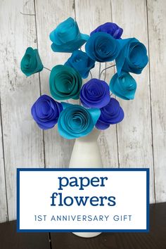 blue paper flowers in a vase with the words paper flowers 1st anniversary gift