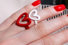 Item Style: Red and White Heart Ring Material: Acrylic Size: Adjustable Valentine's Day Red Heart Ring, Trendy Heart-shaped Rings For Valentine's Day, White Heart-shaped Rings For Valentine's Day, Red Adjustable Heart Ring For Valentine's Day, Adjustable Red Heart Ring For Valentine's Day, Trendy Heart Ring For Valentine's Day, Adjustable White Heart Ring, Trendy Heart Ring For Valentine's Day Anniversary, White Rings For Valentine's Day