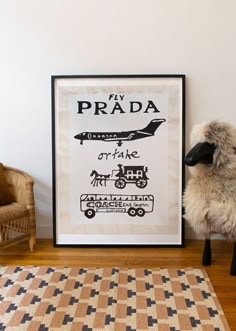 there is a stuffed animal next to a poster on the wall with an airplane in it