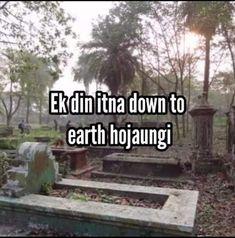 an old cemetery with the words e k din ita down to earth hoaung