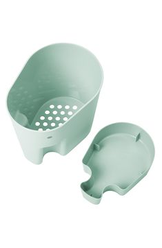 two pieces of plastic strainer with holes in the bottom and one piece on the side