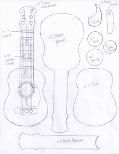 a drawing of an acoustic guitar and parts to make it look like they have been cut out