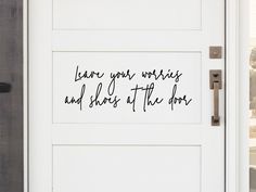 a white door with the words leave your wishes and share at the door