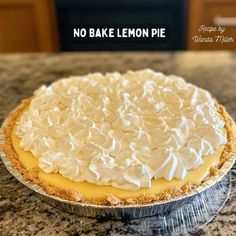 no bake lemon pie sitting on top of a kitchen counter next to an oven