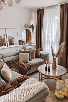 a living room filled with lots of furniture and decor