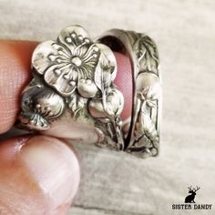 https://www.etsy.com/shop/SisterDandy?ref=l2-about-shopname&from_page=listing&search_query=apple+blossom A beautiful Art Nouveau floral ring!  Created from an apple blossom spoon originally made by Dominic & Haff, this ring depicts has a detailed and intricate depiction of each individual blossom. This ring is made from a vintage sterling silver spoon, 925, nickel-free. This ring will be adjusted to the size you request but it can easily be tightened or loosened at home should you want a differe Spoon Rings Silver, Vintage Spoon Jewelry, Flower Spoon, Vintage Spoon Rings, Apple Rings, Apple Flowers, Textures Fashion, Silver Spoon Ring, Flower Rings