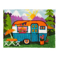 a rug with an image of a camper on it