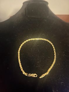 This beautiful bracelet is made of 14k yellow gold and features a lobster closure. The bracelet is 8 inches in length and has a stylish rope chain design. The main stone is a 2.6 mm wide yellow gold stone with no secondary stones. The seller provides a warranty for this piece of fine jewelry. It is a perfect addition to any jewelry collection and is made in the United States. Gold Rope Chains, Chain Design, Gold Stone, Rope Chain, Chain Link Bracelet, Beautiful Bracelet, Link Bracelets, Chain Bracelet, Chain Link