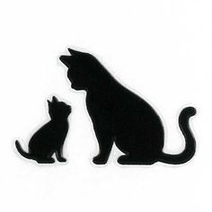 two cats sitting next to each other in the shape of a cat and kitten silhouette