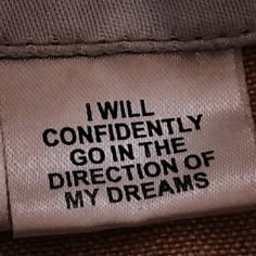 i will confidently go in the direction of my dreams label on a brown cloth bag